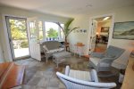 Sun room with access to deck and living room